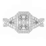 Top view of TR050 pie-cut emerald diamond halo ring, seamless step-cut cluster in octagonal halo, twist pavé band visible below head, F–G VS clarity