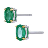 18kt white gold natural vivid green oval emerald stud earrings 6x4mm claw set side close up