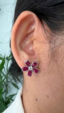 18kt gold invisible set ruby five-petal flower earrings AER063 worn, 5.00ct total, available in yellow white and rose gold, Trinity Designer Jewel