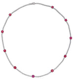 18kt white gold natural ruby diamond station necklace close up
