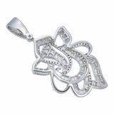 Back view of  18kt gold Ganesha pendant APD057, baguette and round brilliant diamonds continuing onto bail, full diamond coverage from top to base, 5cm total length