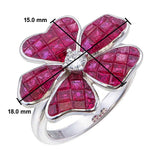 Close-up of precision invisible set natural ruby petals on orchid flower ring