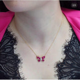 18kt gold invisible set ruby butterfly pendant ANK029 worn on chain, 2.75ct total, available in yellow white and rose gold, Trinity Designer Jewel