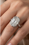 Modern 18K White Gold Bezel Set Pie-Cut Illusion Diamond Solitaire Ring on a finger