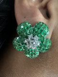 18k White Gold Invisible-Set Tsavorite Flower Stud Earrings on ears view 