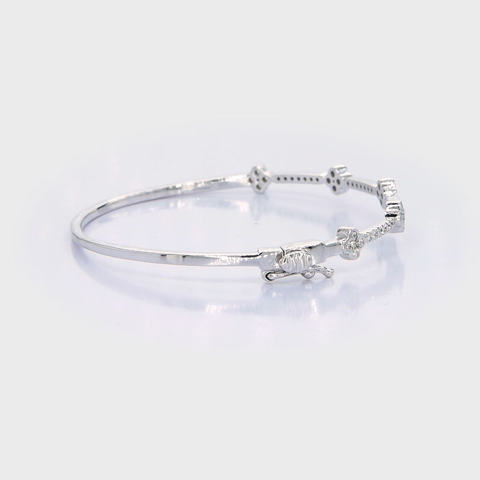 18kt gold natural diamond flower half bangle bracelet AB035 rotating 360 degrees — 0.60ct round brilliant diamonds in continuous pavé row with four raised flower cluster motifs, hinged clasp, available in yellow white and rose gold, custom fine jewellery made in Bangkok Thailand