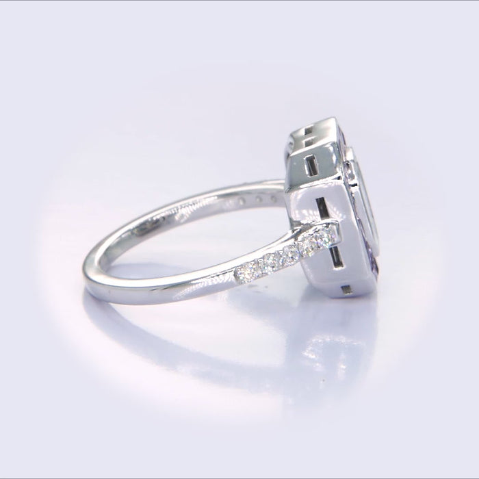 Vintage-Inspired Pie-Cut Diamond Illusion Ring with Invisible-Set Violet Sapphire Halo video profile